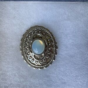 Source Unknown Silver brooch purchased at the Vatican.